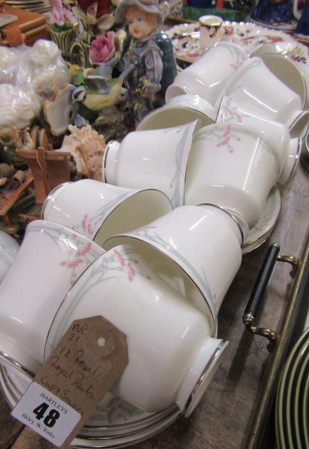 TWELVE ROYAL DOULTON CARNATION CUPS AND SAUCERS Image