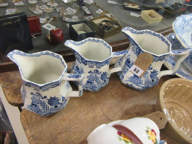 SET OF THREE MASONS BLUE AND WHITE JUGS Image