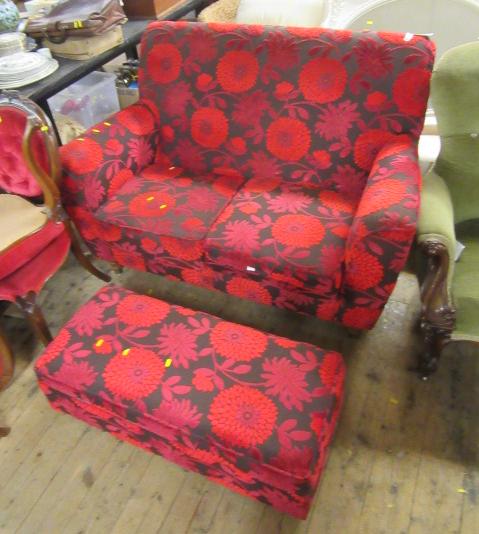 Red floral pattern upholstered settee and footstool | Hartleys ...