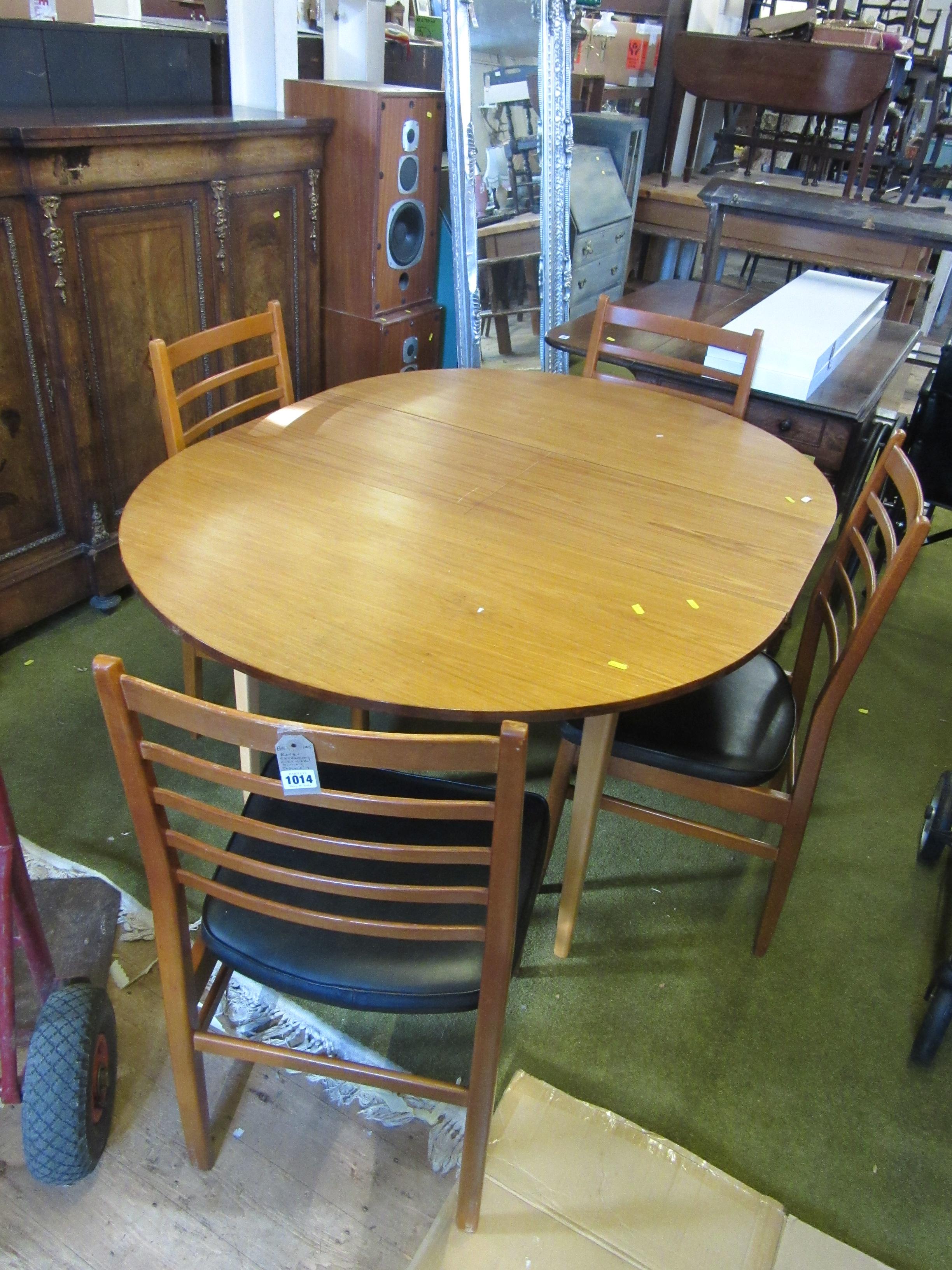 RETRO EXTENDING CIRCULAR DINING TABLE AND FOUR CHAIRS Image