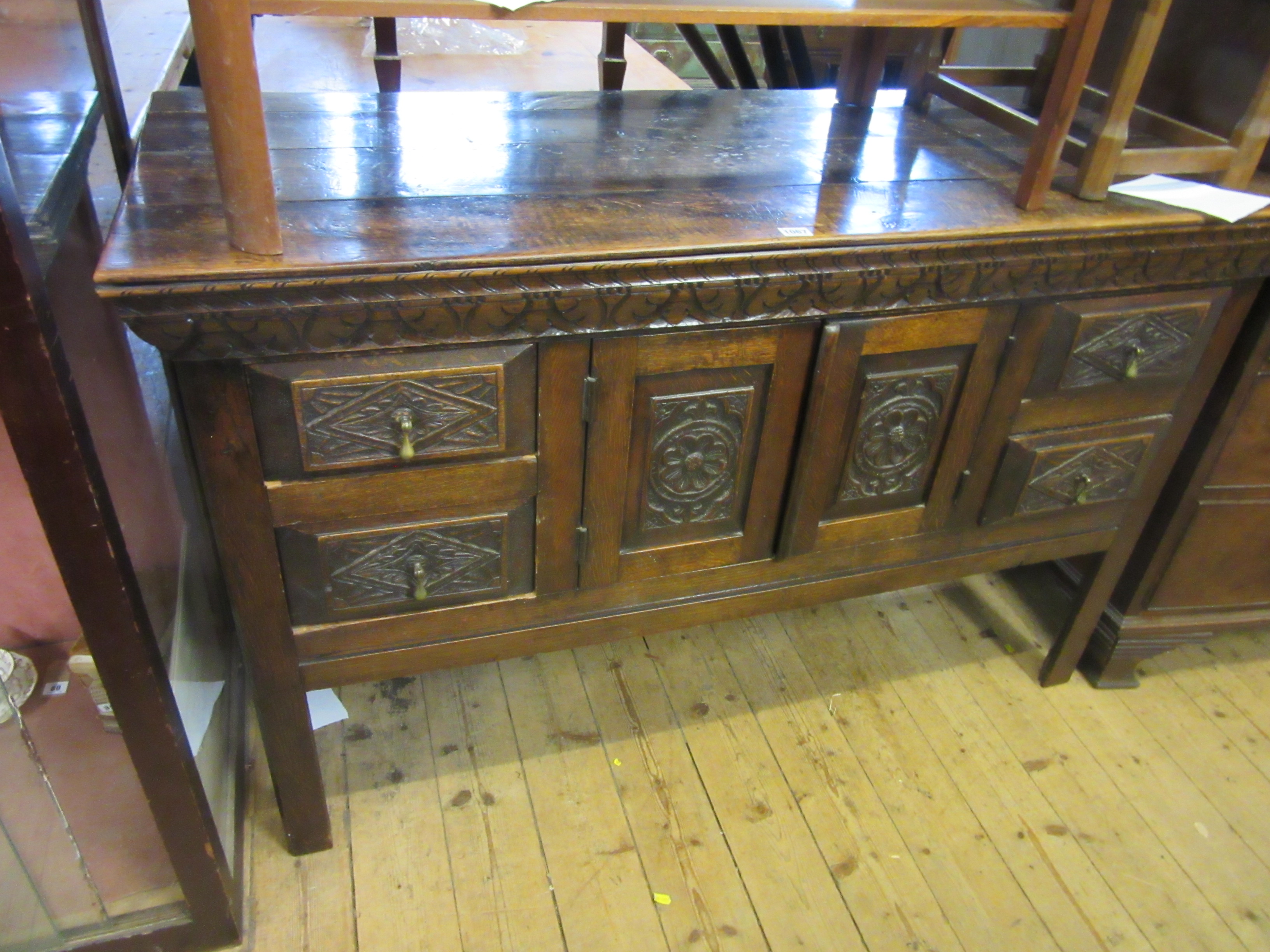 OAK CARVED CUPBOARD WITH DRAWERS Image