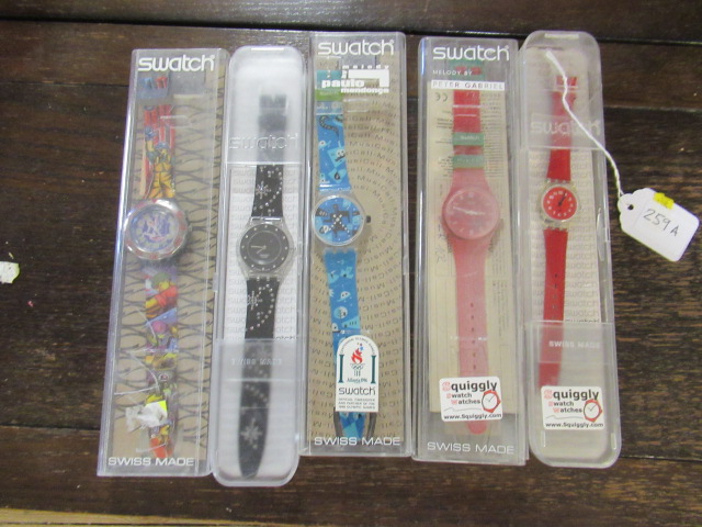 FIVE BOXED SWATCH WATCHES INCLUDING RED RHYTHM 1997 AND TOVARISCH Image