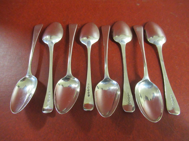 EIGHT GEORGIAN AND VICTORIAN SILVER DESSERT SPOONS Image