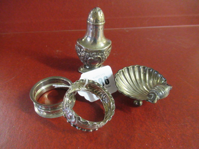 TWO SILVER NAPKIN RINGS, SHELL SALT AND PEPPERETTE Image