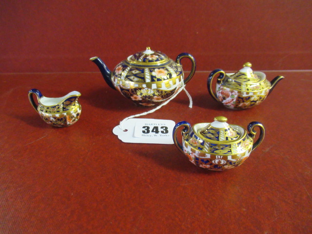 MINIATURE ROYAL CROWN DERBY TEAPOT 1926 AND THREE MATCHING ITEMS Image