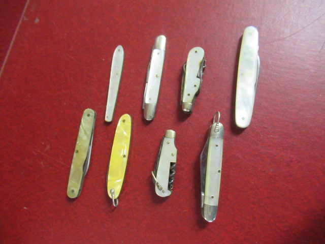 EIGHT MOTHER OF PEARL PEN KNIVES Image