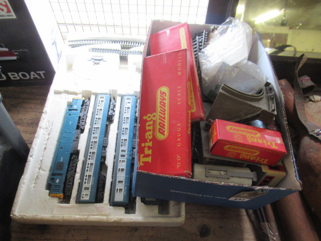 QUANTITY OF TRAIN TRACK AND CARRIAGES Image