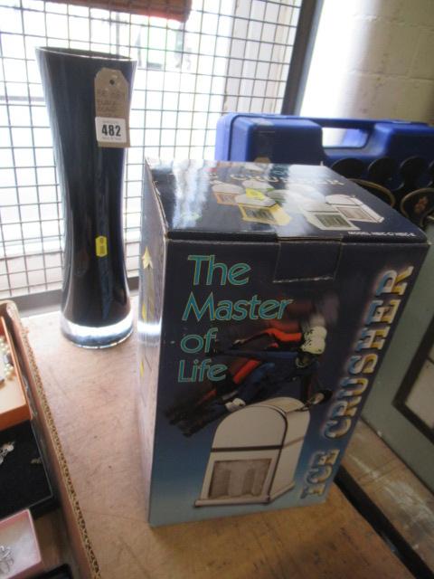 BLACK GLASS VASE AND AN ICE CRUSHER Image
