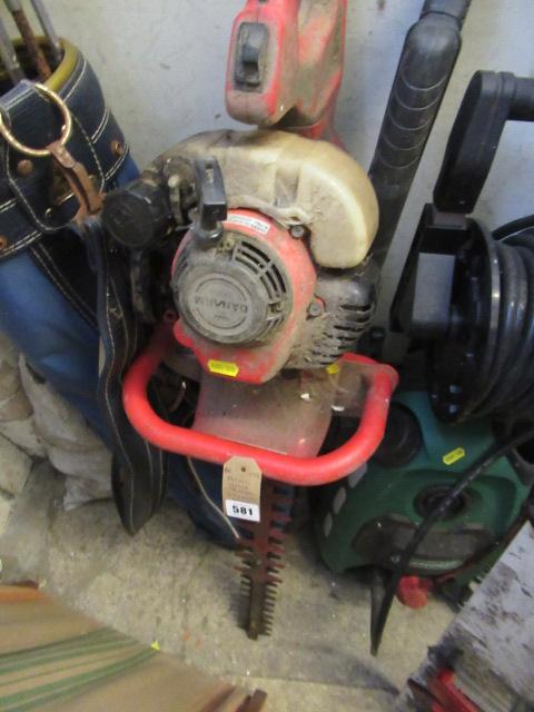 PETROL HEDGE TRIMMER AND A TRAILER BOARD Image