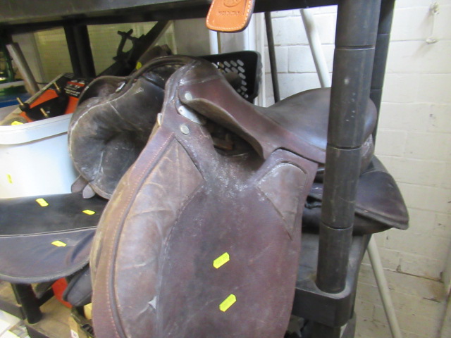 TWO LEATHER HORSE SADDLES AND A PAIR OF BOOTS Image