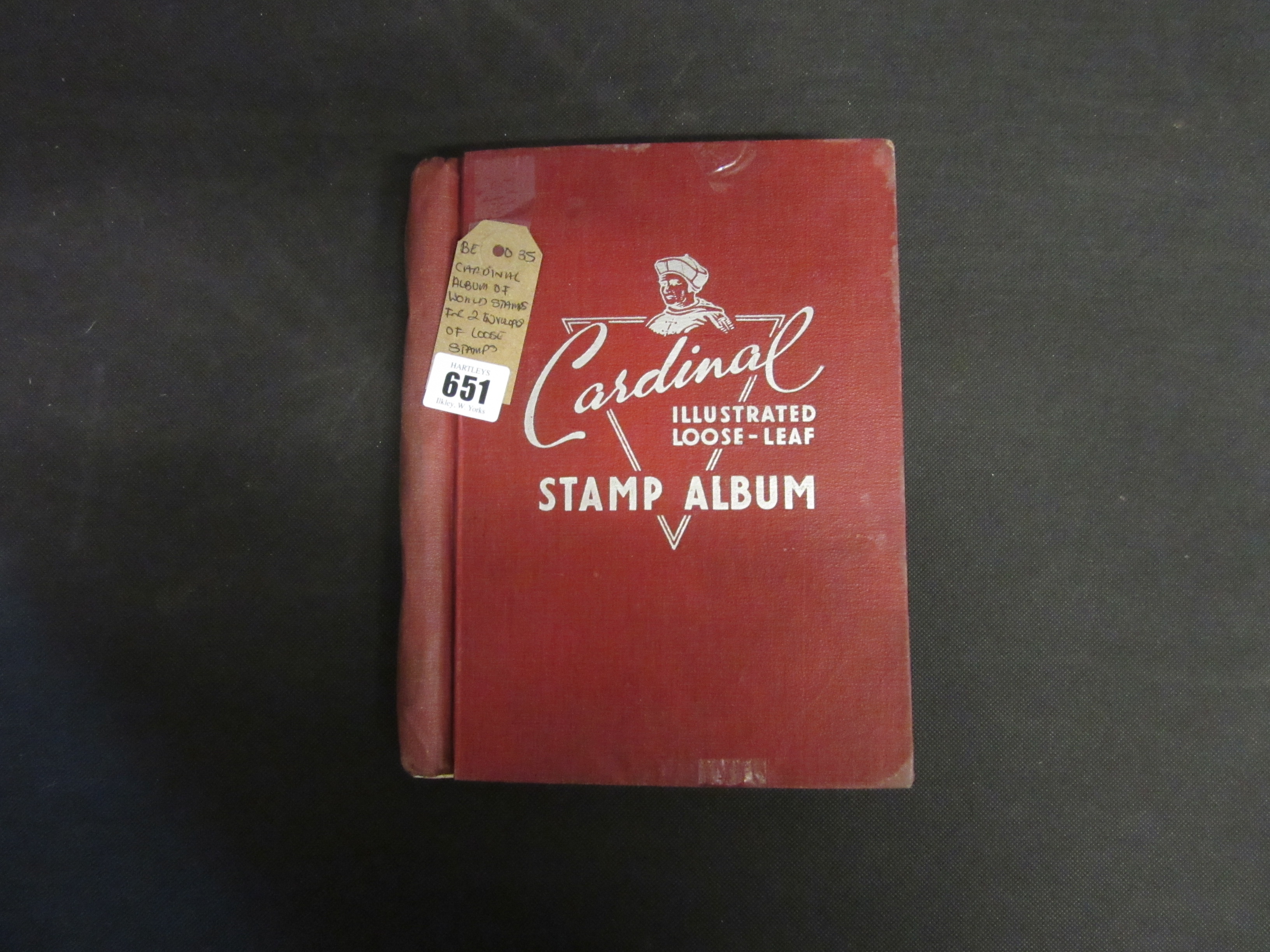 CARDINAL ALBUM OF WORLD STAMPS WITH TWO ENVELOPES OF LOOSE STAMPS Image