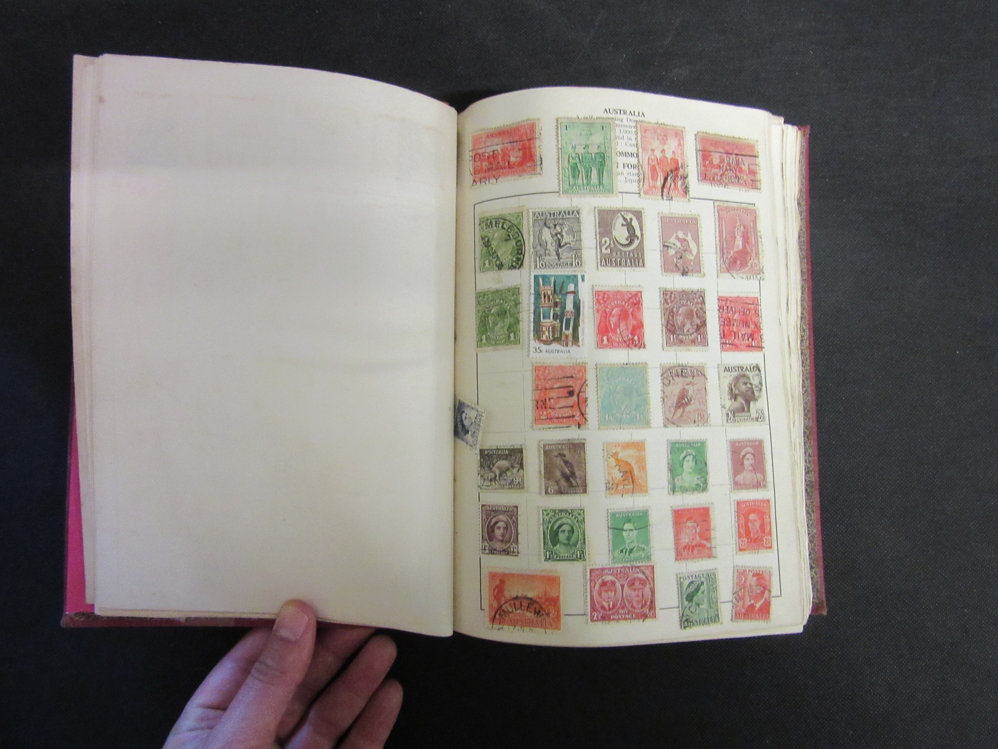 CARDINAL ALBUM OF WORLD STAMPS WITH TWO ENVELOPES OF LOOSE STAMPS Image