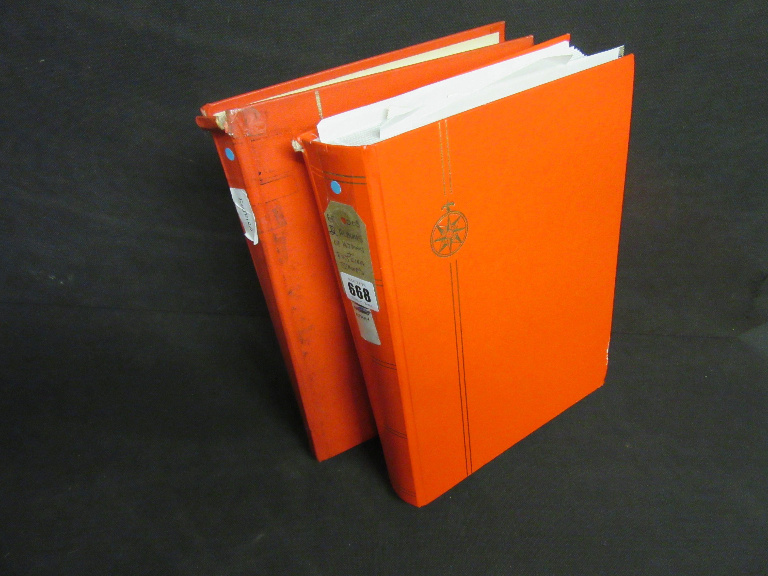 TWO ALBUMS OF AJMAN AND FUJEIRA STAMPS Image