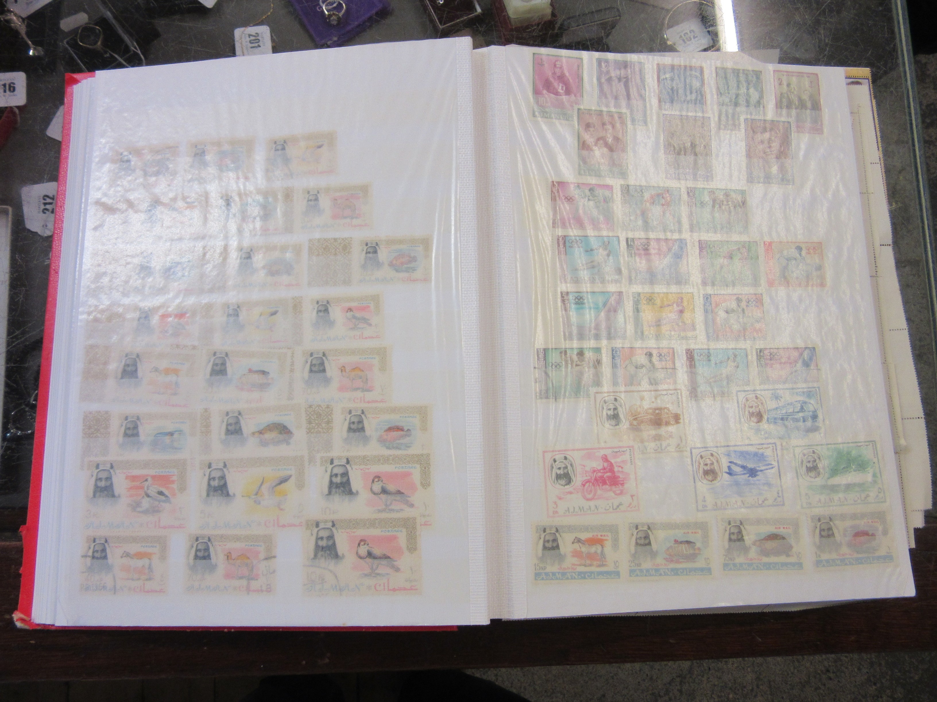 TWO ALBUMS OF AJMAN AND FUJEIRA STAMPS Image