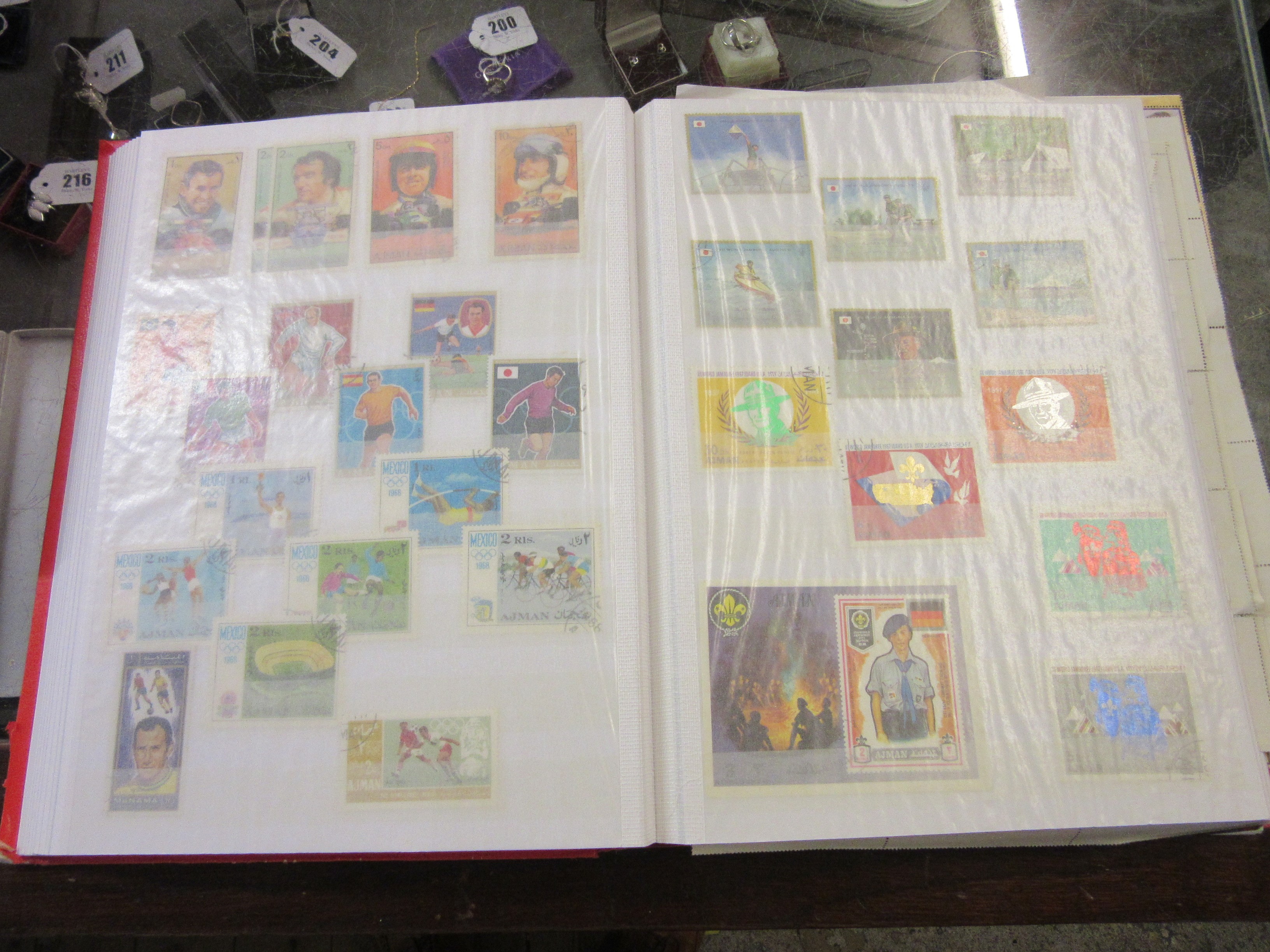 TWO ALBUMS OF AJMAN AND FUJEIRA STAMPS Image