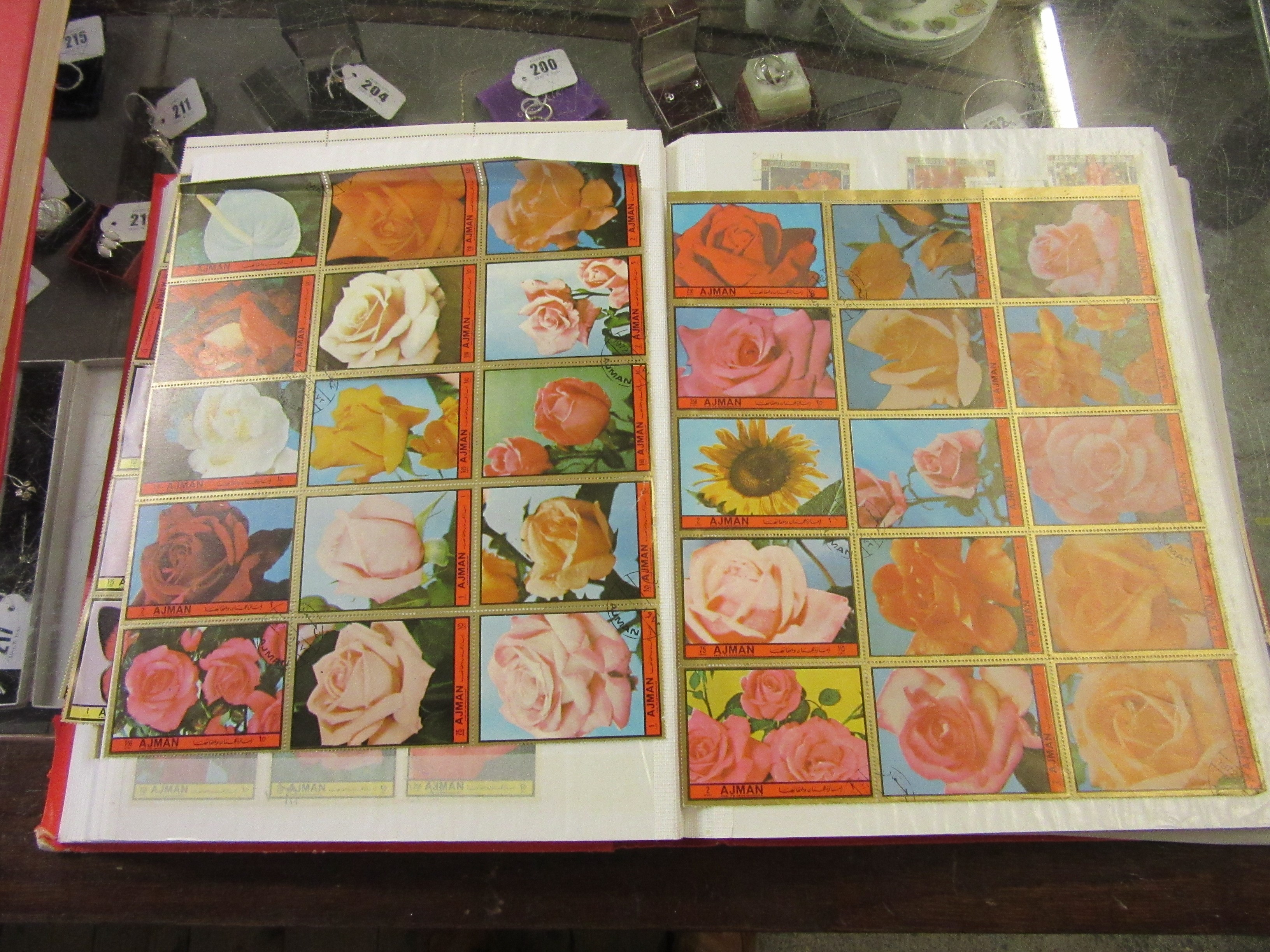 TWO ALBUMS OF AJMAN AND FUJEIRA STAMPS Image