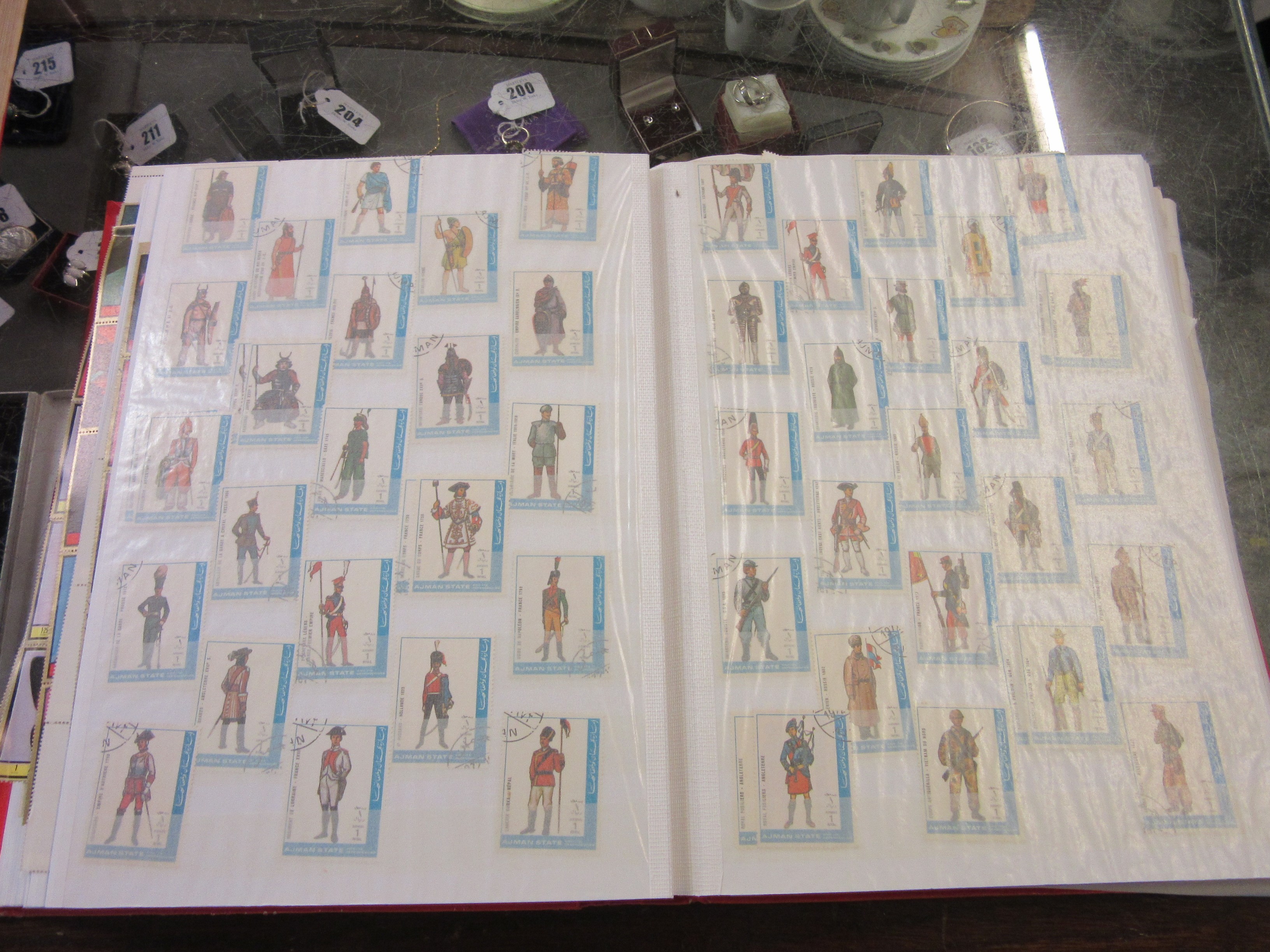 TWO ALBUMS OF AJMAN AND FUJEIRA STAMPS Image