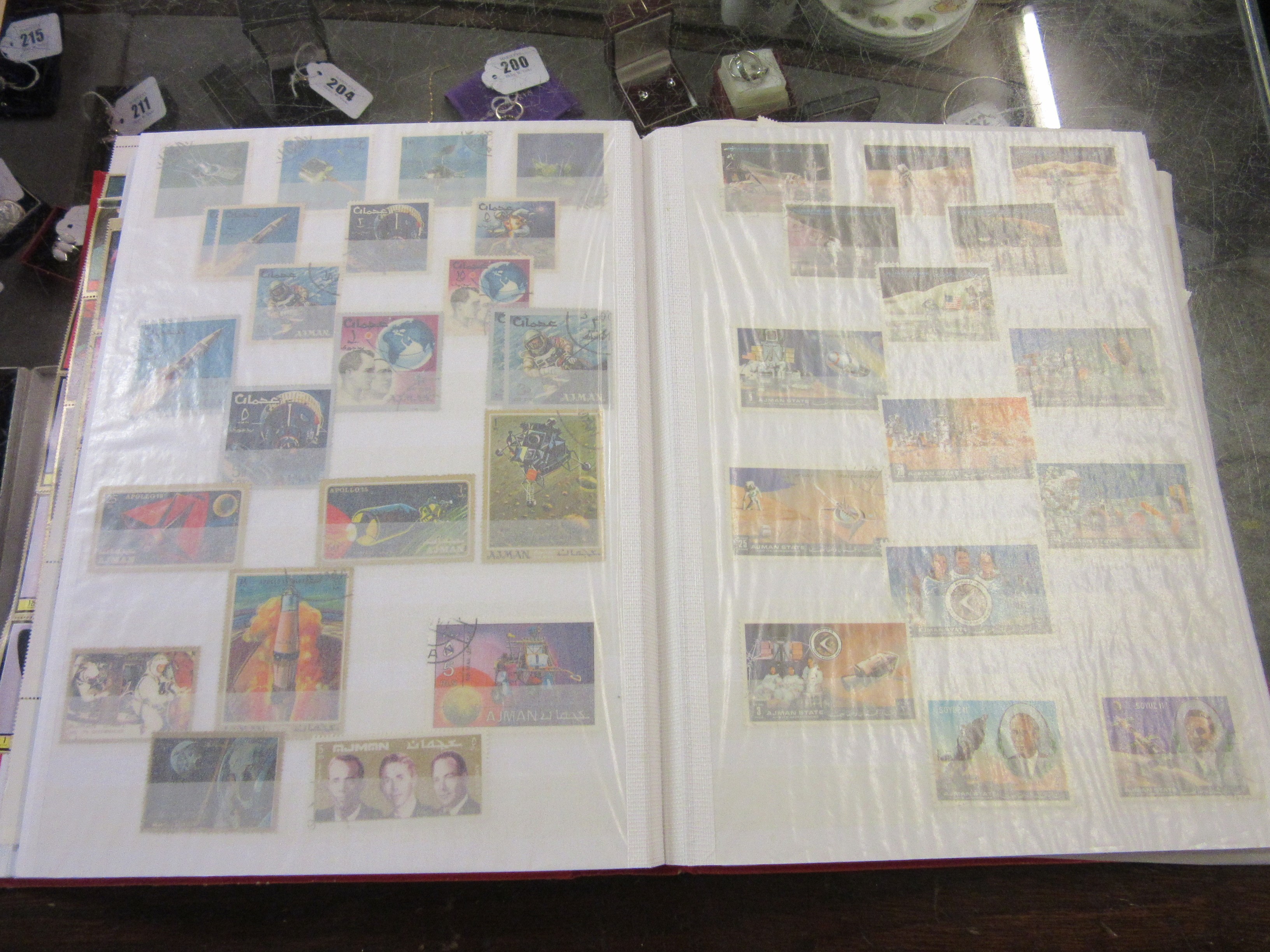 TWO ALBUMS OF AJMAN AND FUJEIRA STAMPS Image