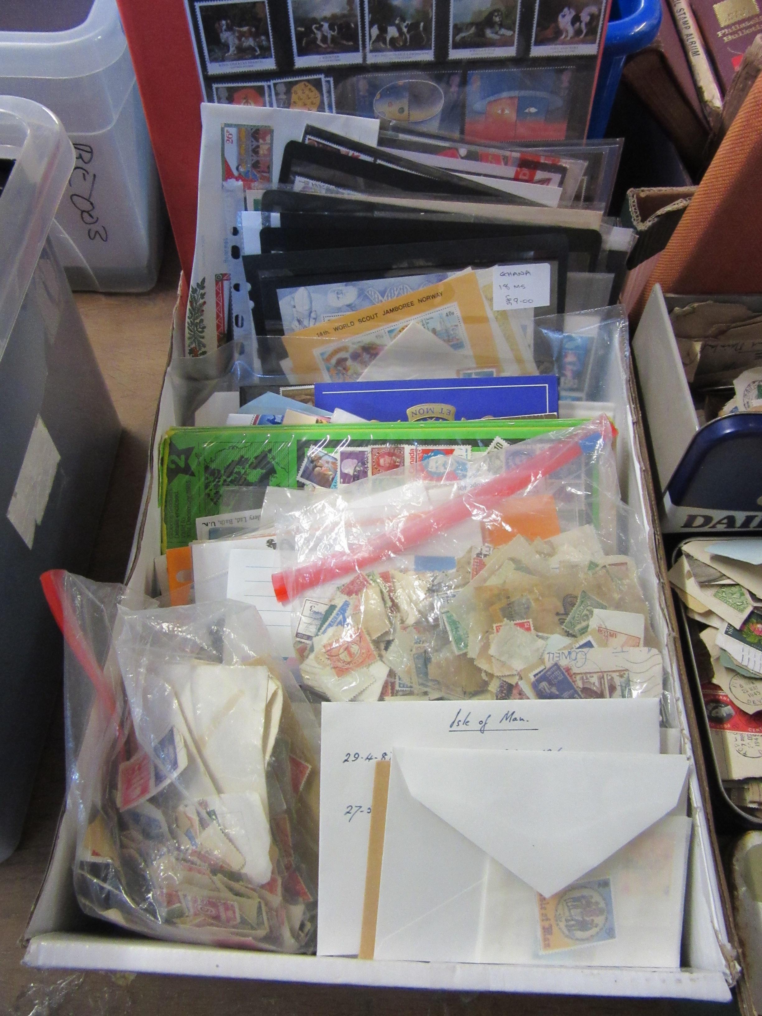 BOX OF PRESENTATION PACKS OF GB MINT STAMPS AND JERSEY STAMPS Image