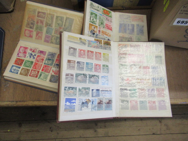 THREE SMALL ALBUMS OF STAMPS Image
