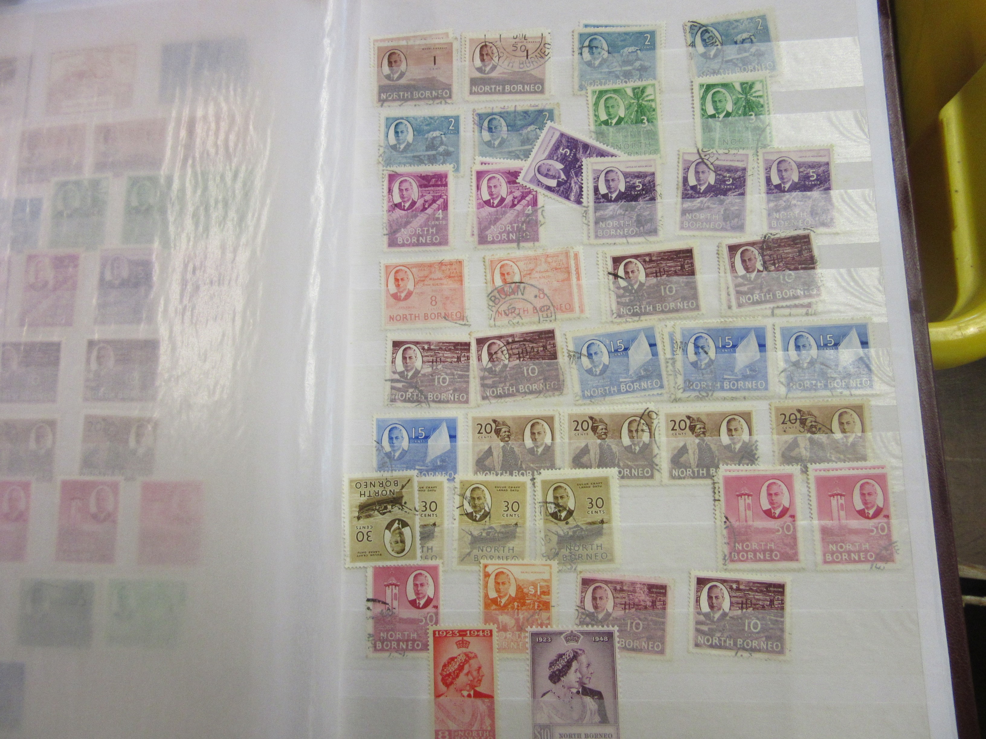 THREE ALBUMS OF MALAYSIAN, NORTH BORNEO, CAMBODIAN AND LAOS STAMPS Image