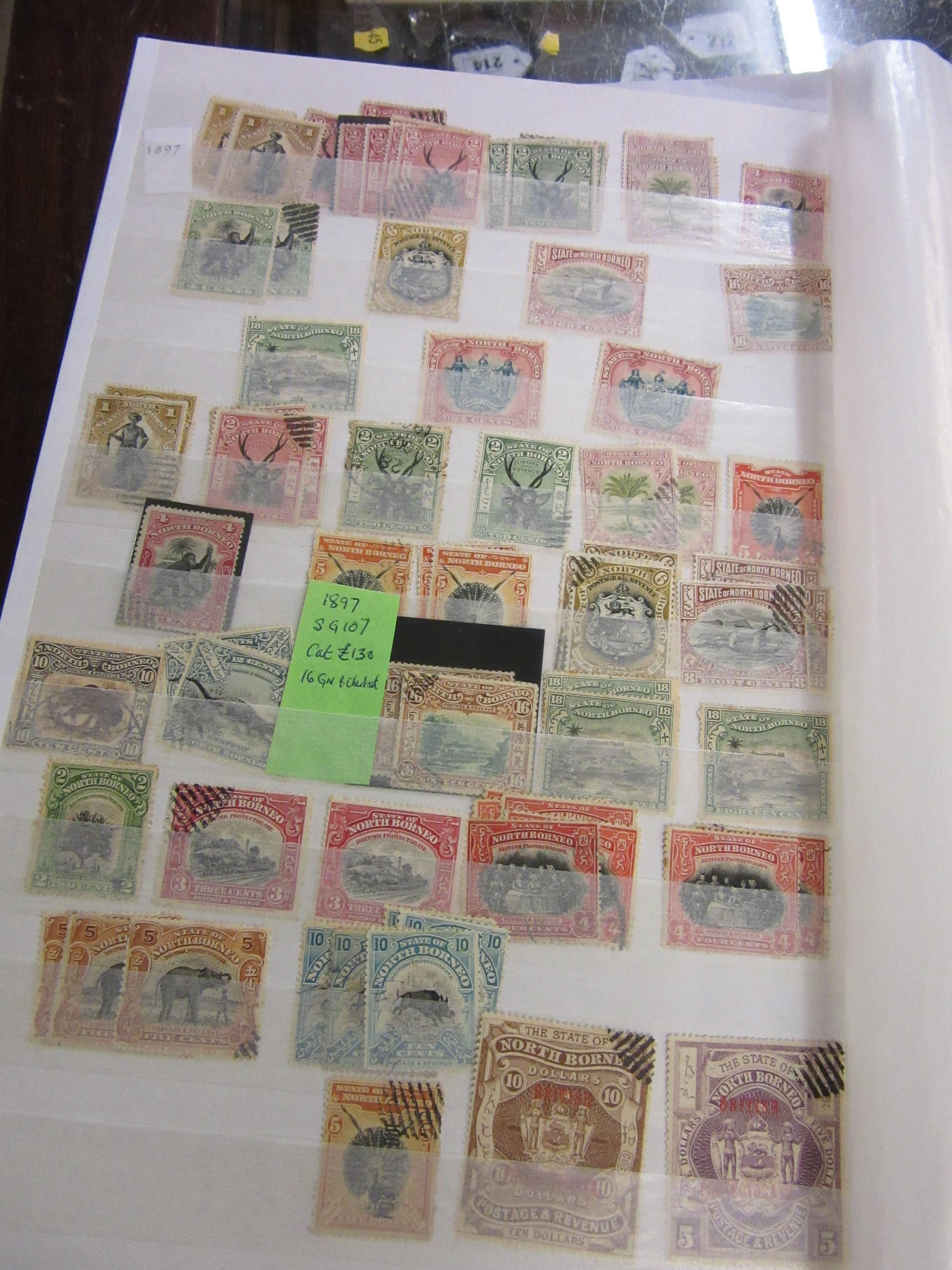 THREE ALBUMS OF MALAYSIAN, NORTH BORNEO, CAMBODIAN AND LAOS STAMPS Image