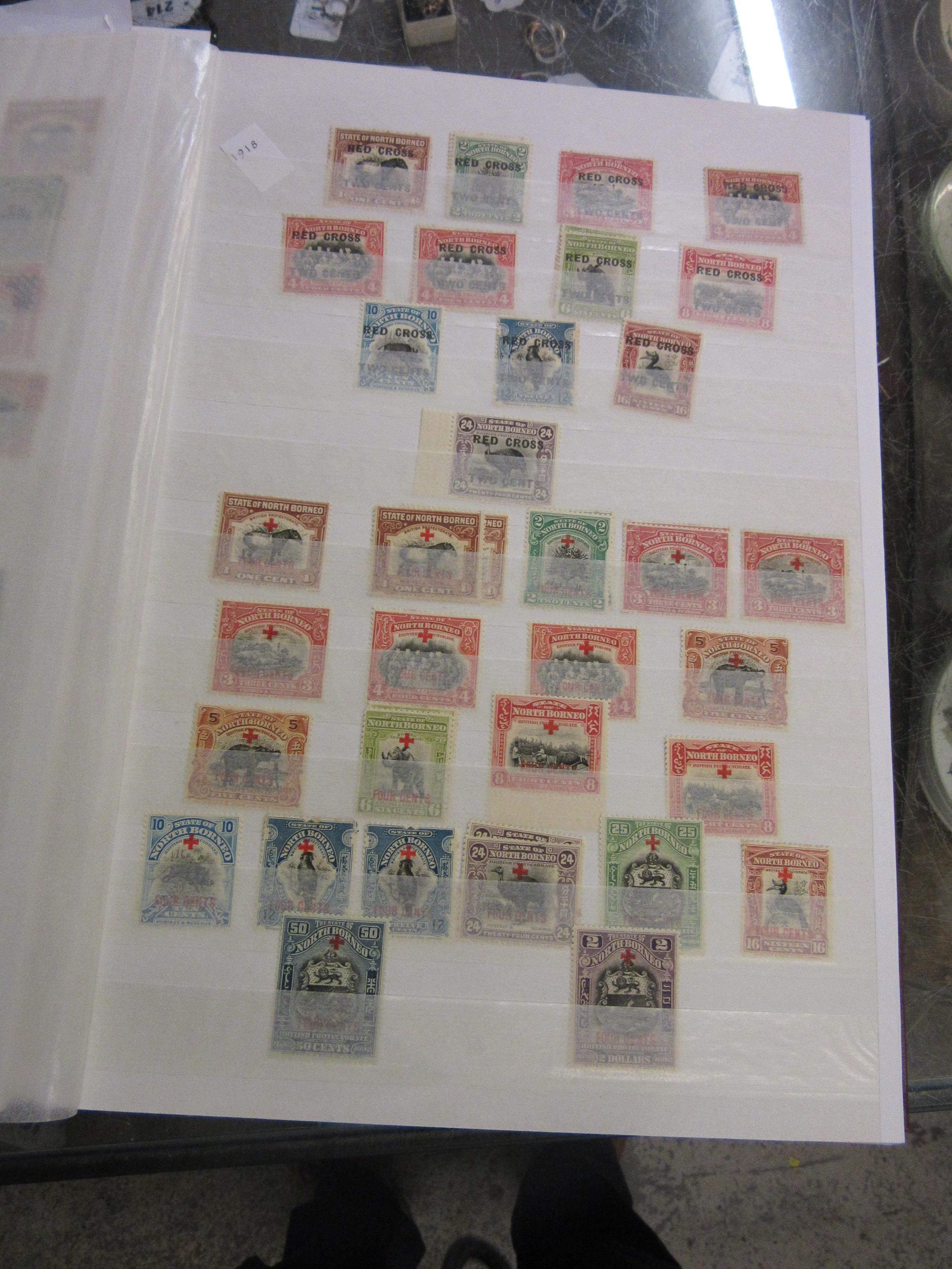 THREE ALBUMS OF MALAYSIAN, NORTH BORNEO, CAMBODIAN AND LAOS STAMPS Image