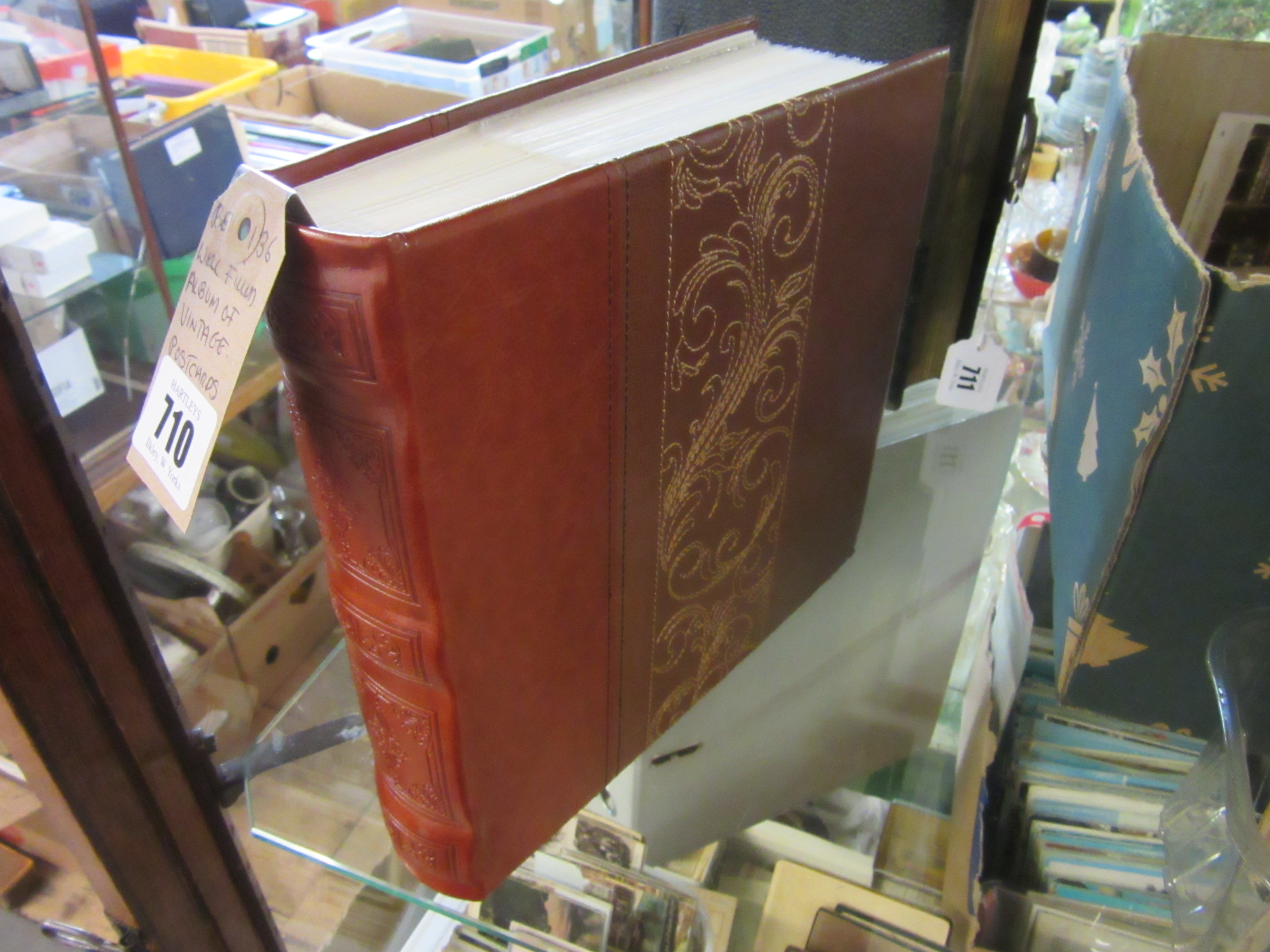 WELL FILLED ALBUM OF VINTAGE POSTCARDS Image