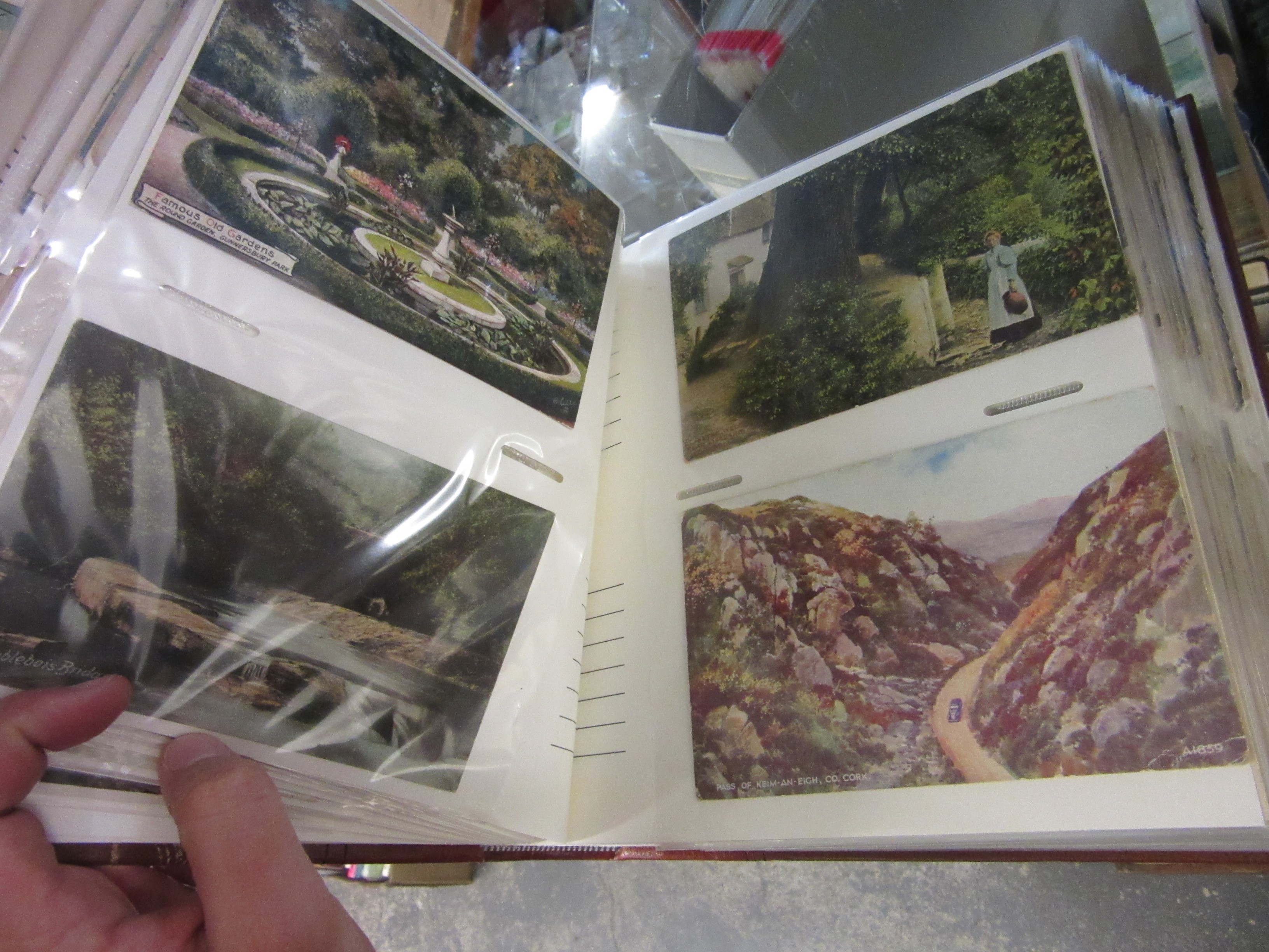 WELL FILLED ALBUM OF VINTAGE POSTCARDS Image