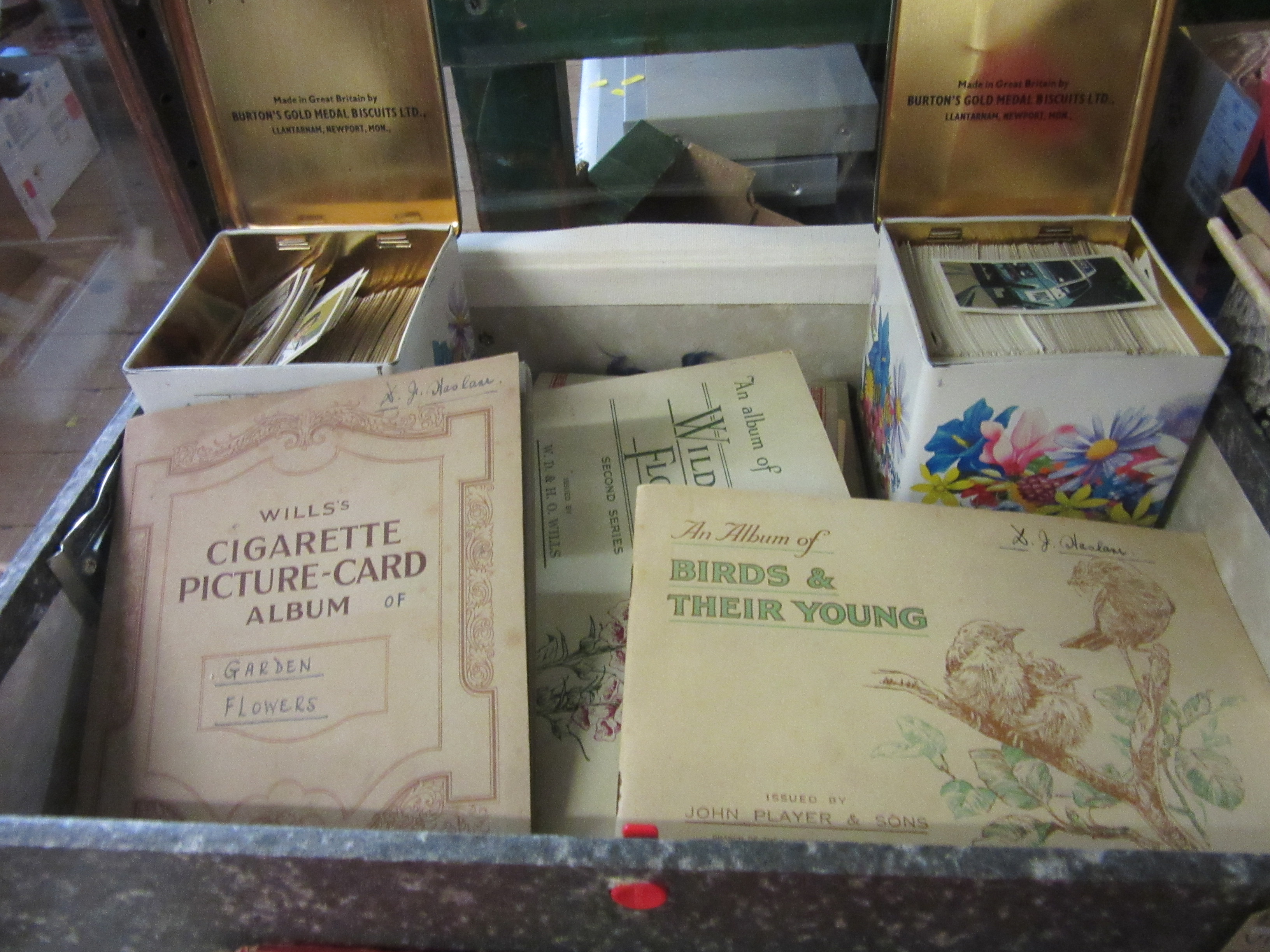 VINTAGE TINS WITH ALBUMS OF CIGARETTE CARDS Image