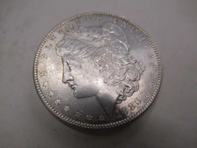 1886 SILVER DOLLAR AND OTHER US COINS Image