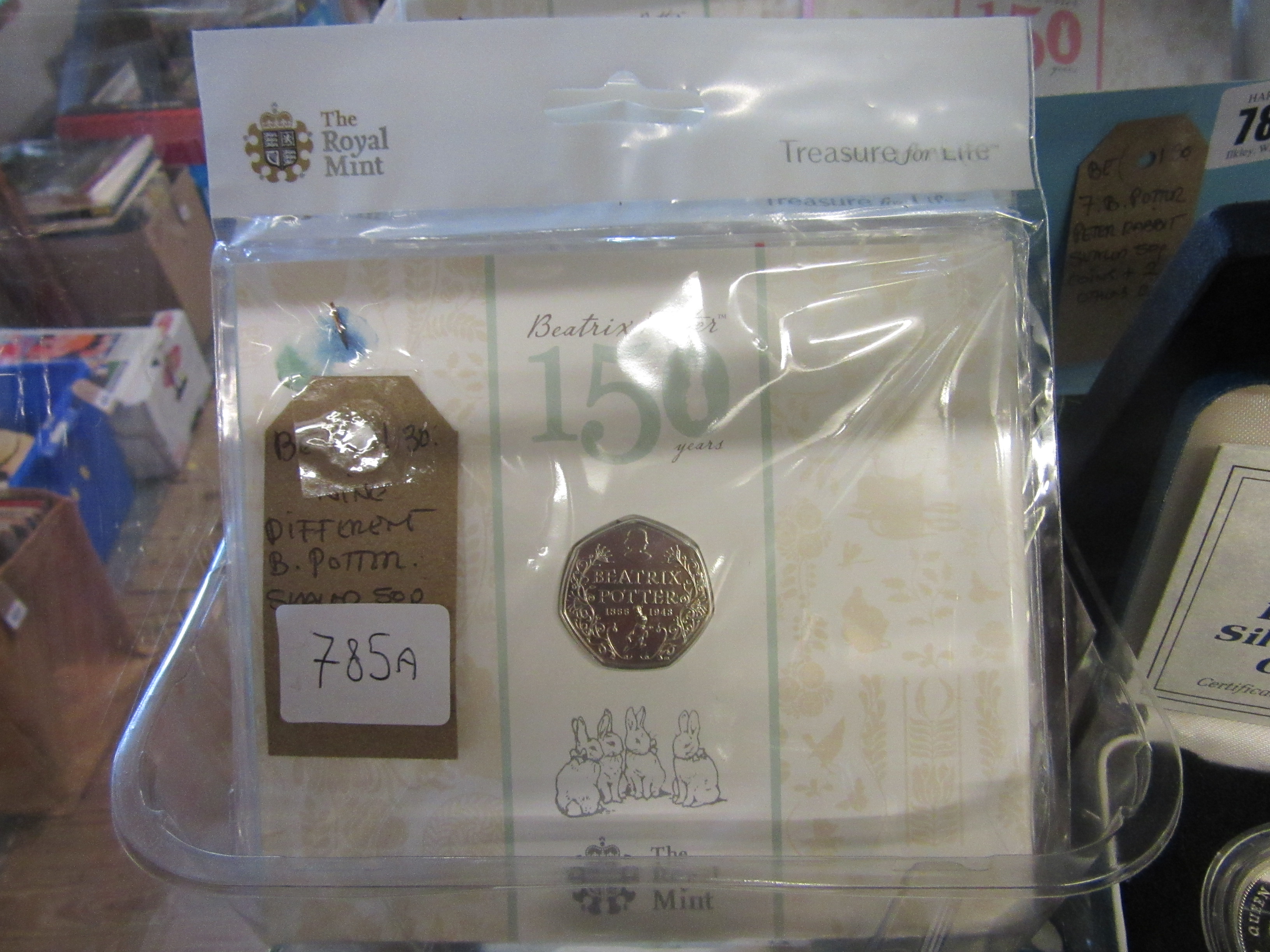 NINE DIFFERENT BEATRIX POTTER SEALED FIFTY PENCE COINS Image