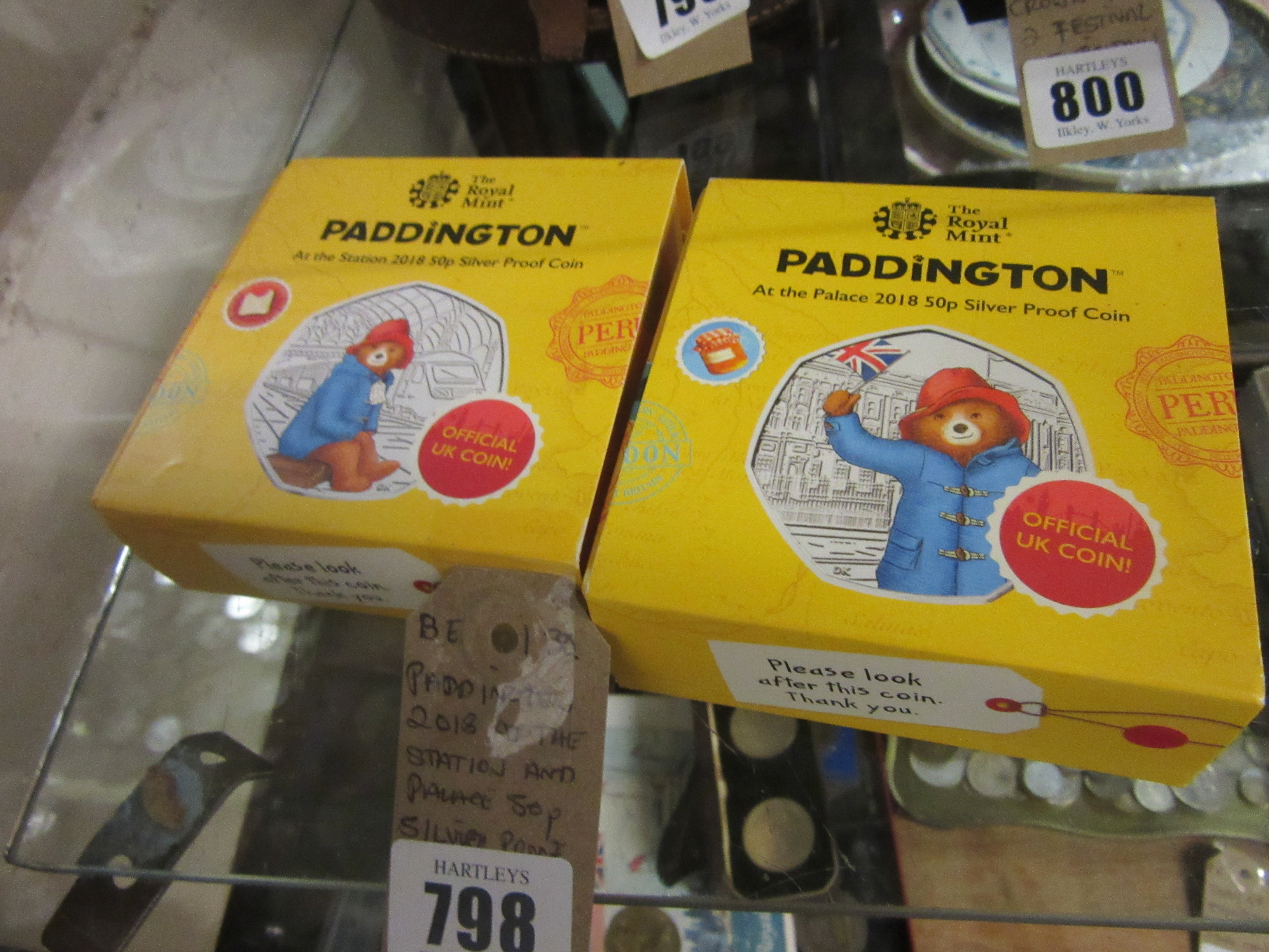 PADDINGTON 2018 AT THE STATION AND PALACE FIFTY PENCE SILVER PROOF COINS Image