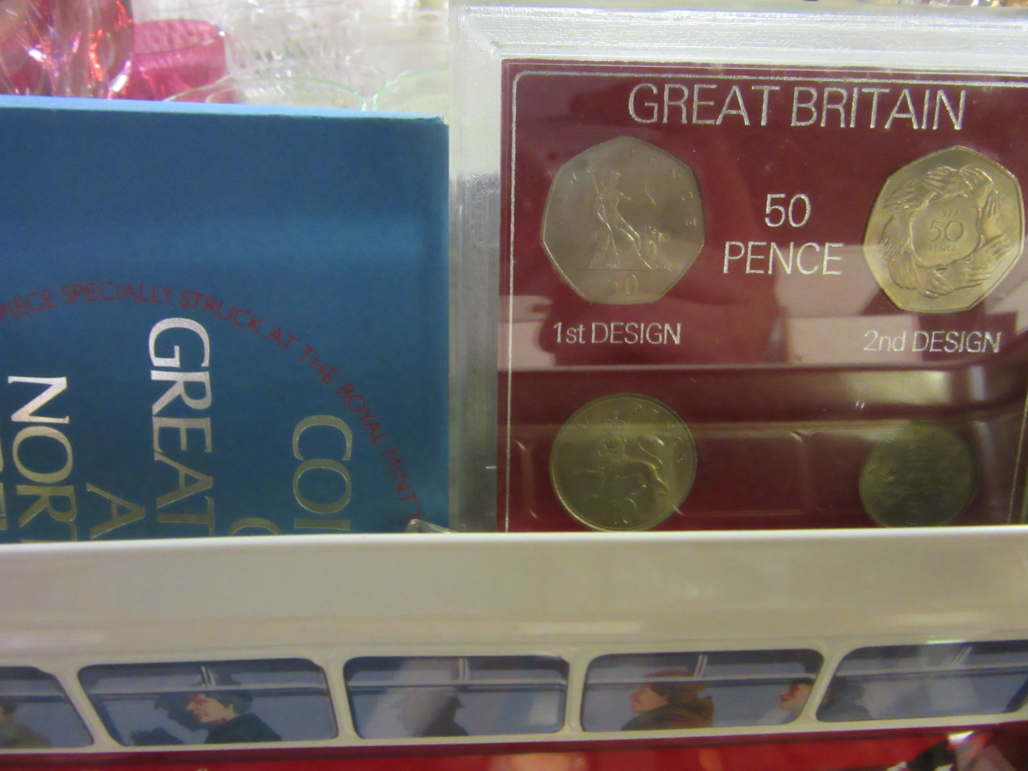 TIN OF GB PROOF COIN SETS WITH LOOSE COINS Image