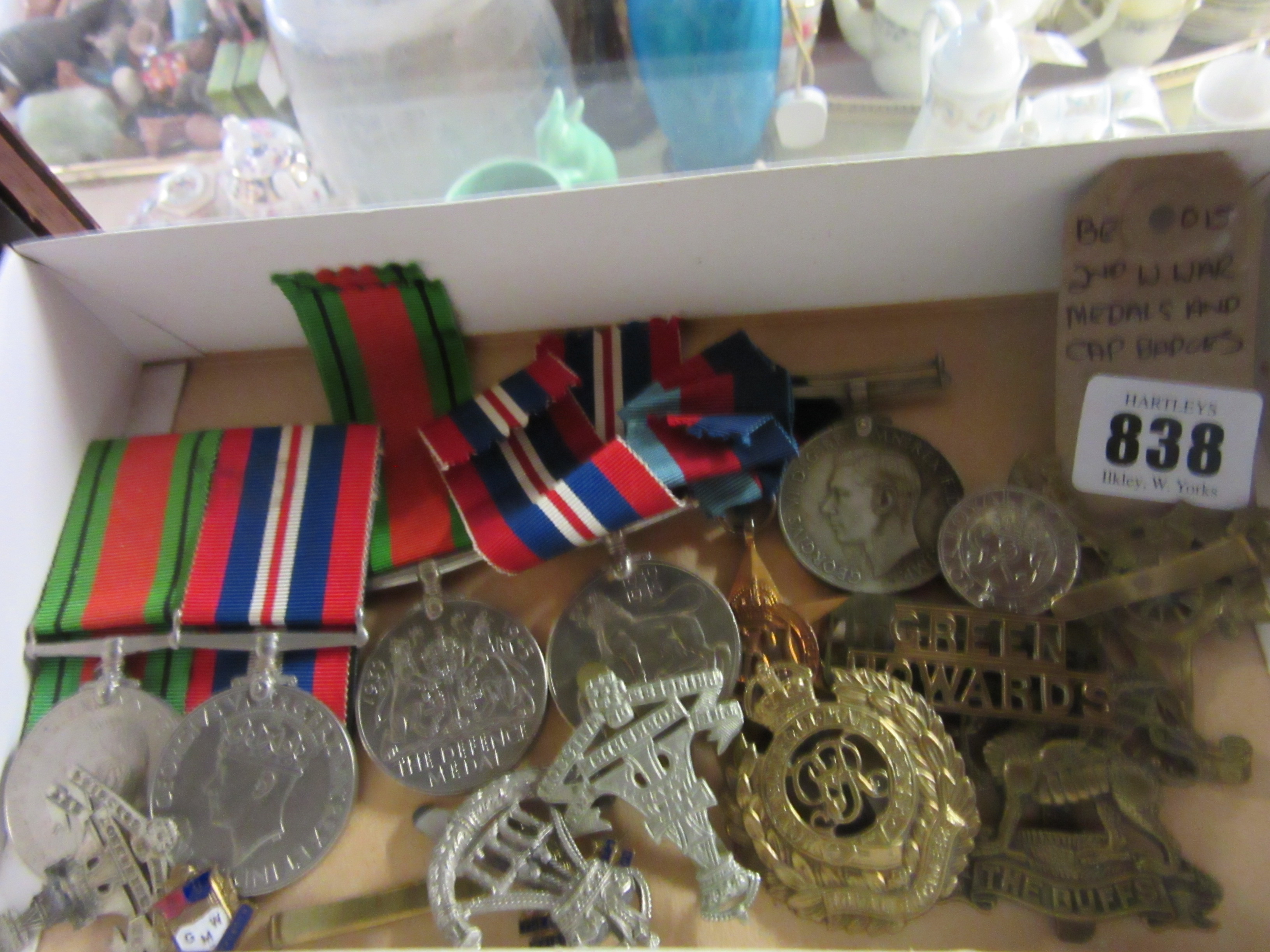 WWII MEDALS AND CAP BADGES Image