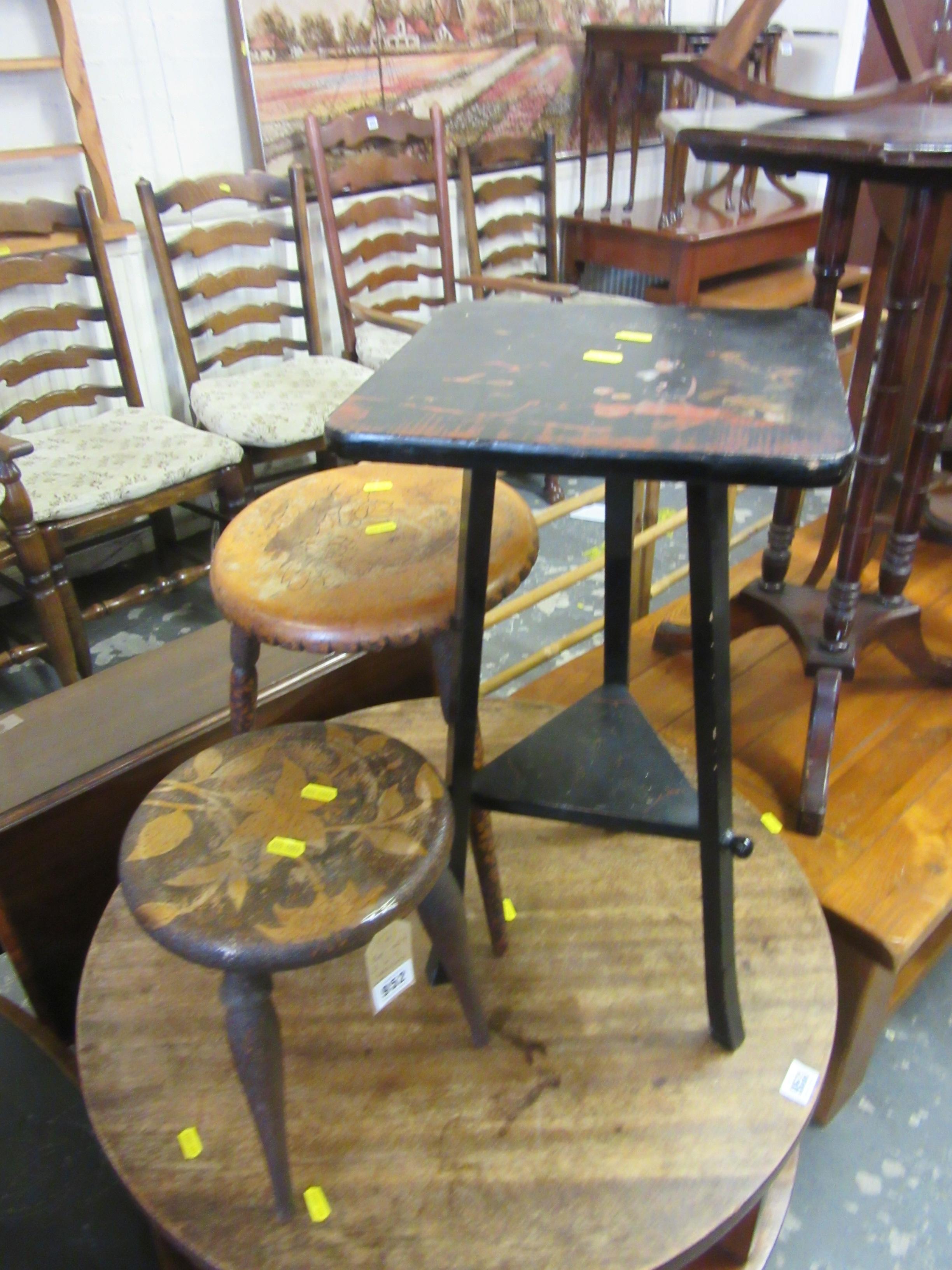 TWO THREE LEGGED STOOL AND AN OCCASIONAL TABLE Image
