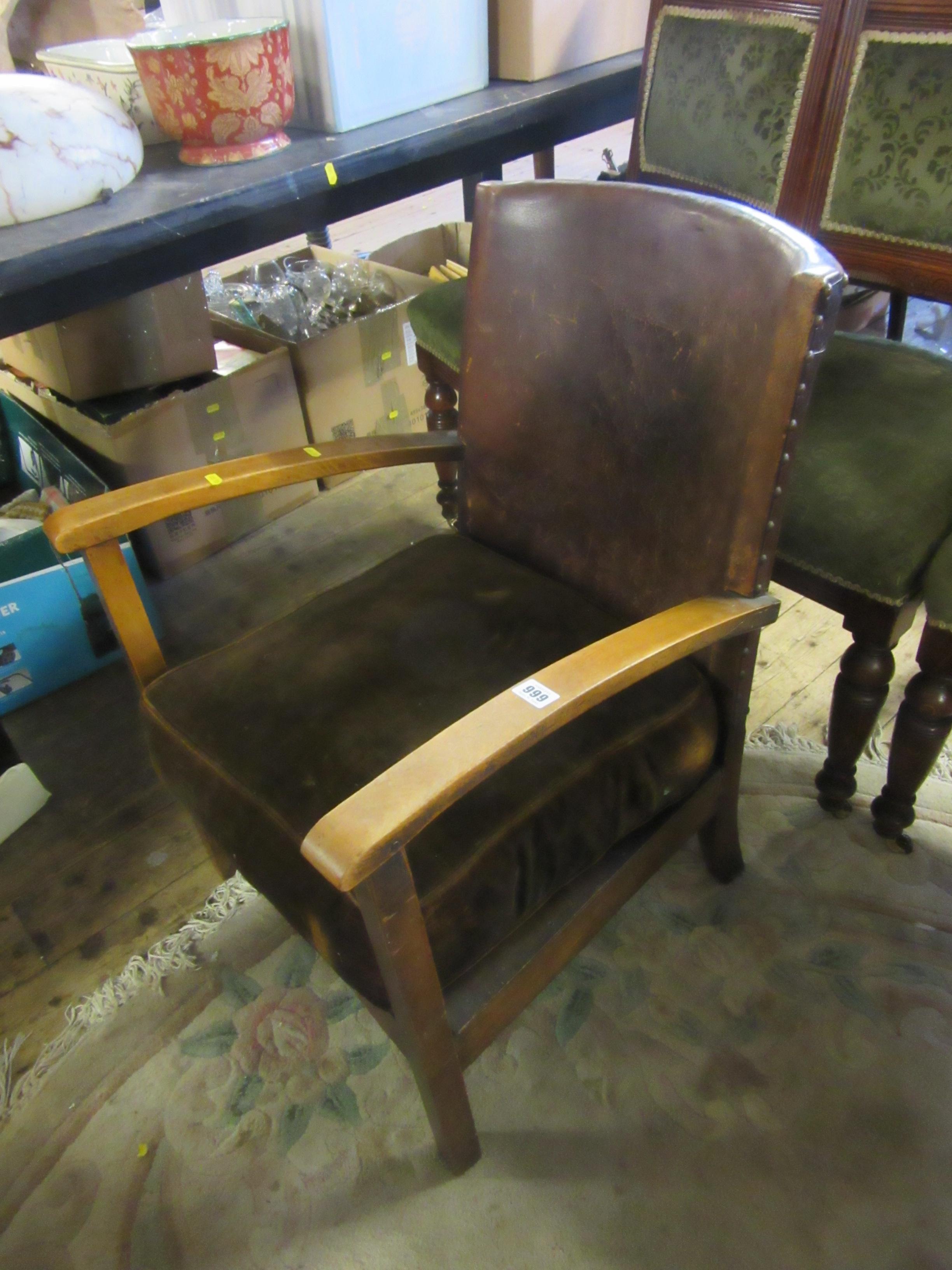 LEATHER BACKED LOW ARMCHAIR Image