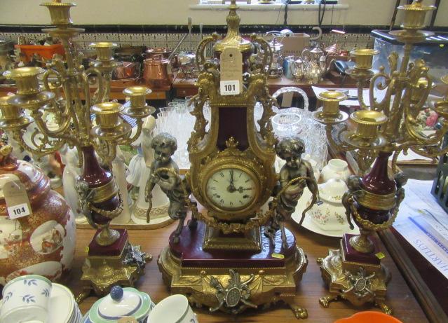 FRENCH STYLE METAL MOUNTED CLOCK AND GARNITURE Image