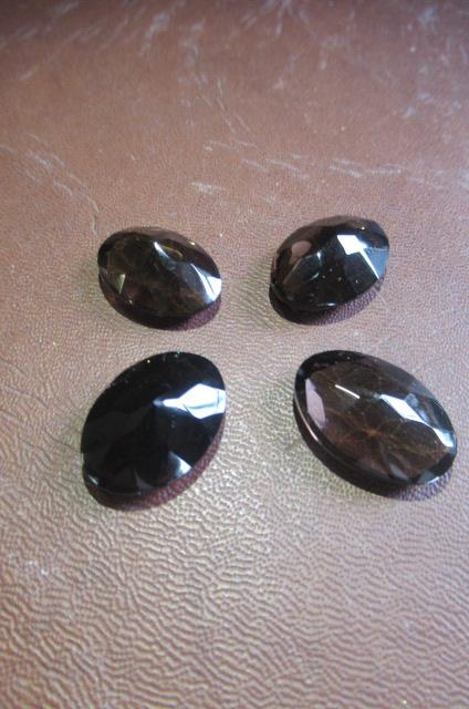 FOUR SMOKEY QUARTZ STONES Image