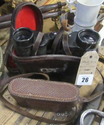 CASED PAIR OF BINOCULARS AND A CAMERA Image