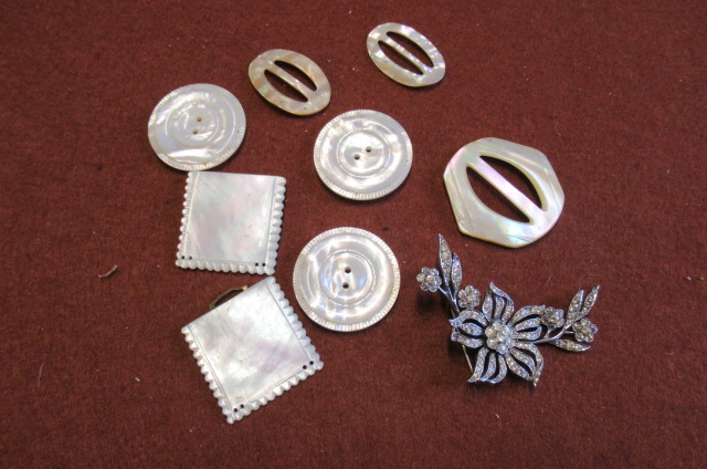 MOTHER OF PEARL BUCKLES AND A BROOCH Image