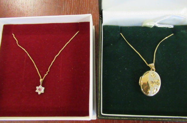 9CT GOLD LOCKET ON CHAIN WITH ANOTHER GOLD CHAIN AND CLUSTER.  Image