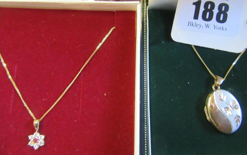 9CT GOLD LOCKET ON CHAIN WITH ANOTHER GOLD CHAIN AND CLUSTER.  Image