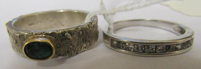 TWO SILVER RINGS Image