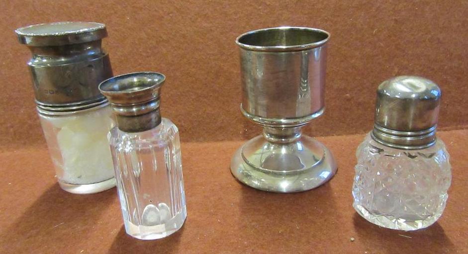 THREE SILVER TOPPED BOTTLES AND ANOTHER Image