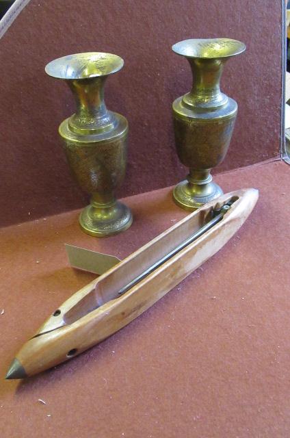 TWO BRASS VASES AND A SHUTTLE Image