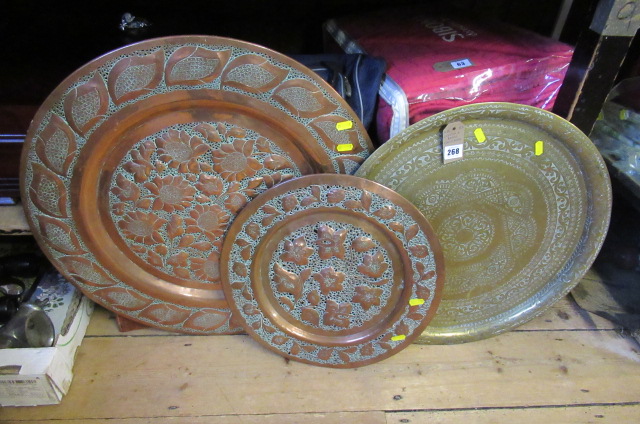 THREE COPPER AND BRASS CHARGERS Image
