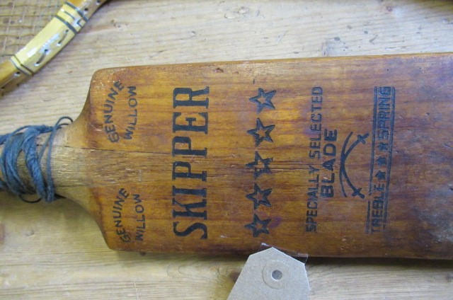 OLD CRICKET BAT AND BADMINTON RACKET Image