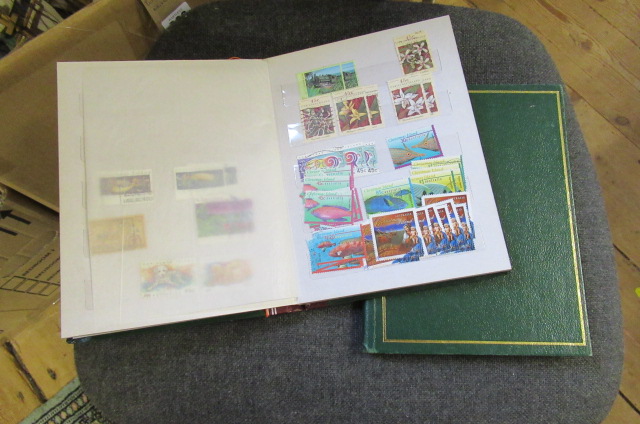 TWO ALBUMS OF PACIFIC ISLAND STAMPS Image