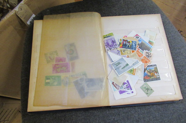 STOCK BOOK CONTAINING WORLD AND COMMONWEALTH STAMPS Image